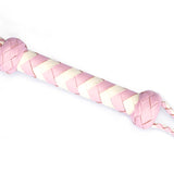 Close-up of white and pink braided leather handle of Fairy collection flogger whip, illustrating premium build and feminine aesthetic