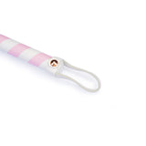 White and pink striped leather flogger whip with rose gold metal accents and hanging loop from Fairy collection