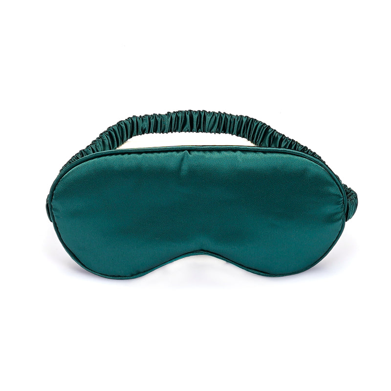 Silky green satin blindfold sleeping mask with elastic straps and soft lining for sensory deprivation and comfort