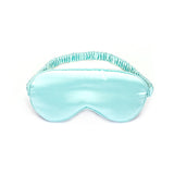 Turquoise silky satin sleeping mask with snug elastic straps for comfort and sensory deprivation