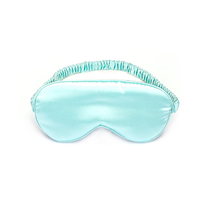 Turquoise silky satin sleeping mask with snug elastic straps for comfort and sensory deprivation