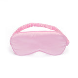 Soft pink satin sleeping mask with elasticated straps for sensory deprivation