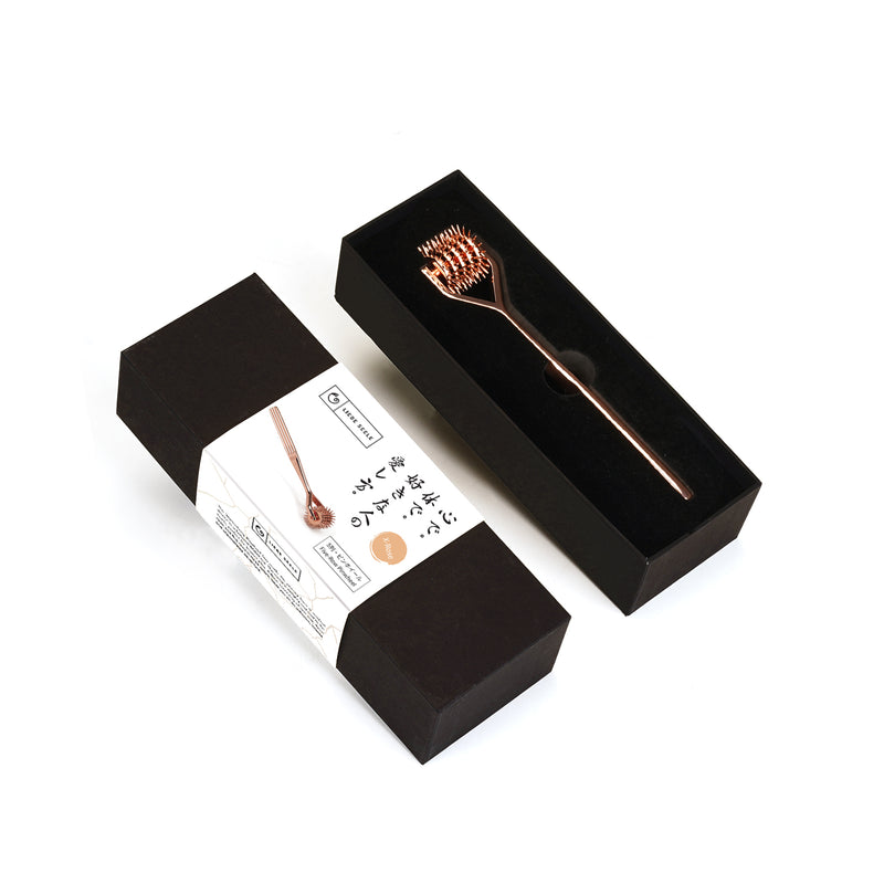 Copper Wartenberg Pinwheel in deluxe black packaging with Japanese label, perfect for impact play and sensory exploration
