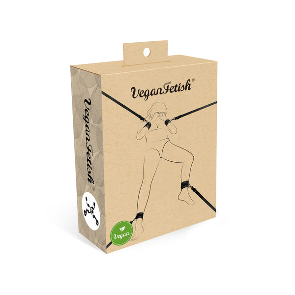 Packaging of Vegan Fetish under-bed restraint set with illustrated bondage position and vegan icons, emphasizing eco-friendly design and beginner-friendly features
