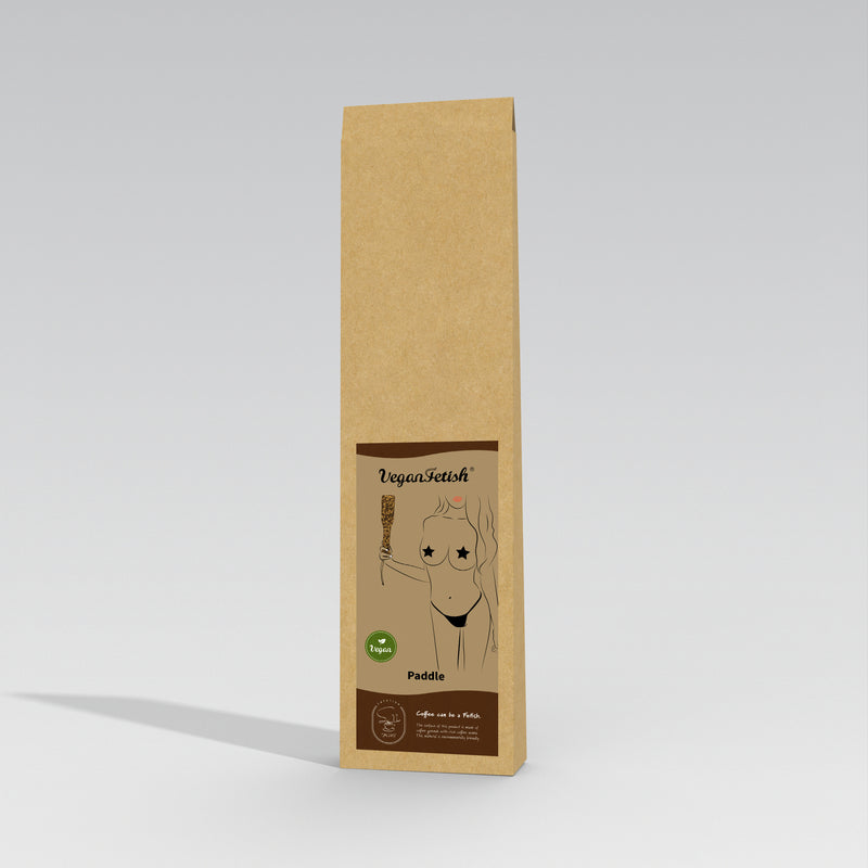 Vegan Fetish SM Cafe Paddle packaging, eco-friendly brown cardboard box featuring a paddle drawing and brand labels including eco-friendly symbol and 'Ethically made in Italy' text