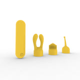 Yellow silicone bullet vibrator with interchangeable heads including dual-tip, brush, and pinpoint designs on a white background