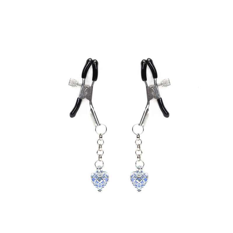 Adjustable nipple clamps with rubber tips and glowing heart-shaped stone pendants in blue