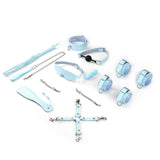 Macaron Electric Blue Beginner's Bondage Kit including blindfold, ball gag, collar and leash, handcuffs, ankle cuffs, paddle, flogger, hog tie, and mini massager
