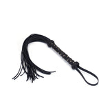 Heavy leather flogger with gold-studded handle and wrist loop from Dark Secret collection for BDSM accessories