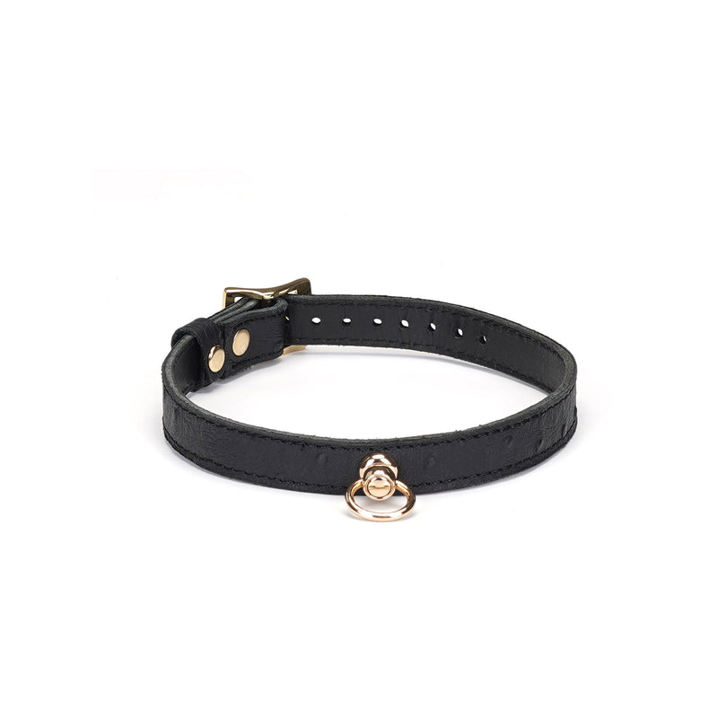 Black leather bondage collar with ostrich skin pattern and gold O-ring from the Demon's Kiss collection