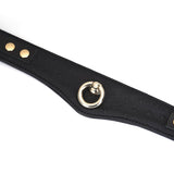 Luxurious black leather bondage collar with ostrich skin pattern and gold O-ring from the Demon's Kiss collection