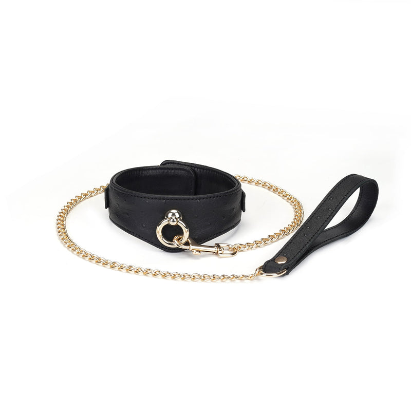 Luxurious black leather curved collar with ostrich skin pattern and gold chain leash from Demon's Kiss collection