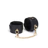 Demon's Kiss: Black Leather Ankle Cuffs with Ostrich Skin Pattern and Gold Hardware