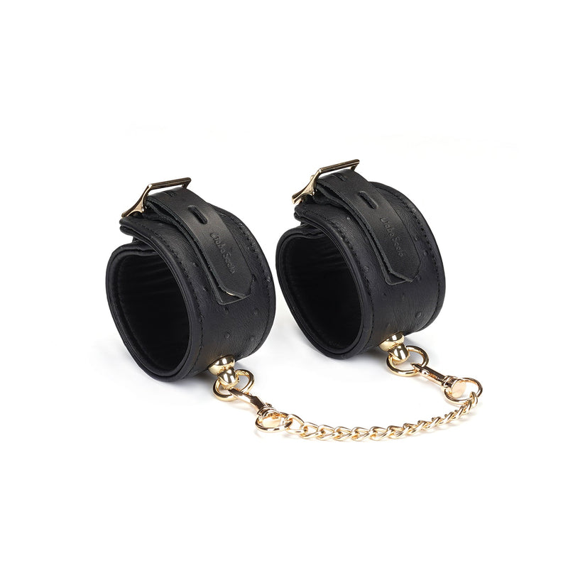 Demon's Kiss: Black Leather Ankle Cuffs with Ostrich Skin Pattern and Gold Hardware