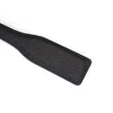 Luxurious black leather spanking paddle with ostrich skin pattern from the Angel's & Demon's Kiss Bondage collection