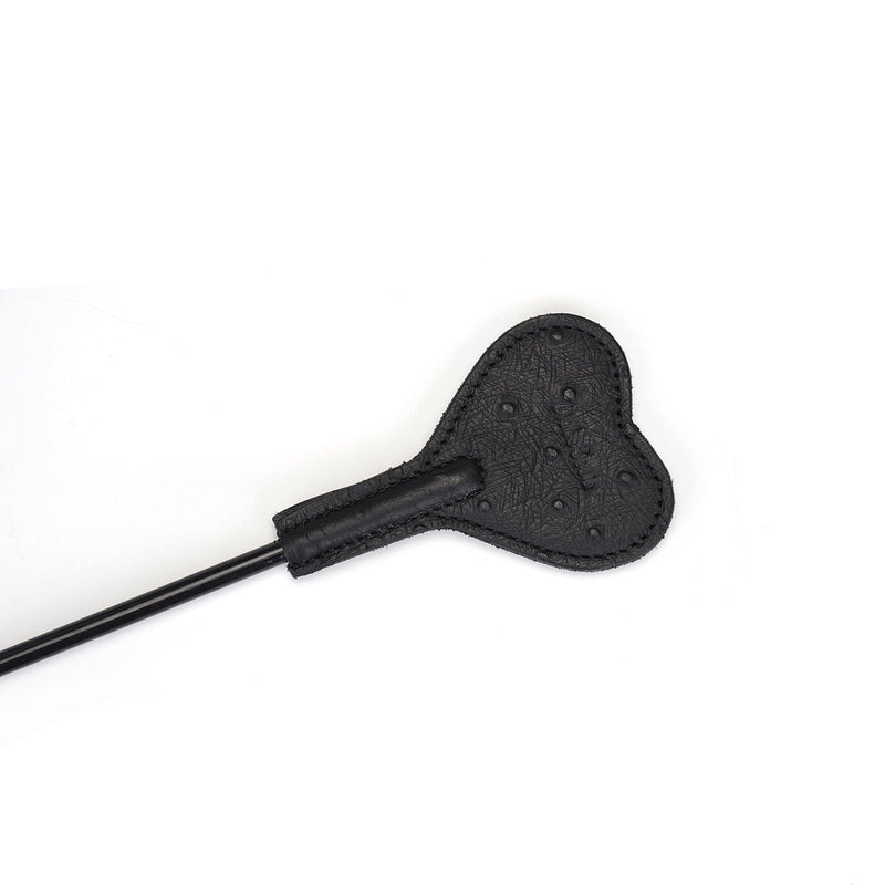 Black leather short riding crop with heart-shaped tip and ostrich skin pattern from Angel's & Demon's Kiss collection