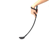 Black leather riding crop with heart-shaped tip and wrist loop for BDSM play