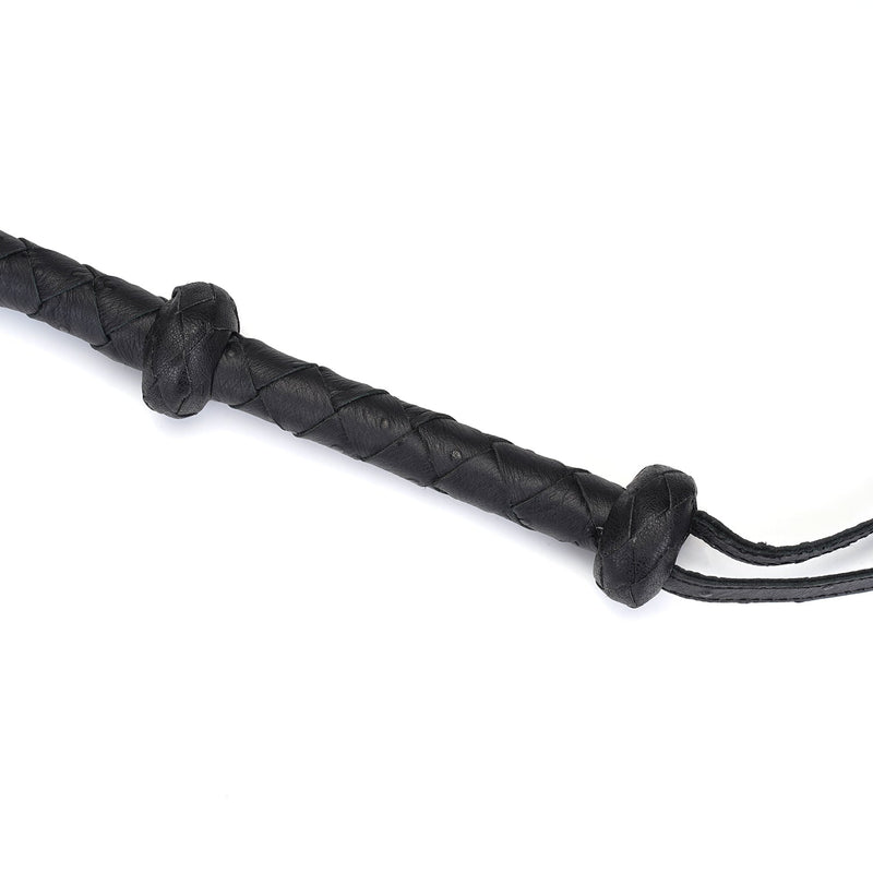 Luxurious black leather braided bullwhip from Demon's Kiss collection, designed for BDSM impact play, showing intricate braiding and craftsmanship