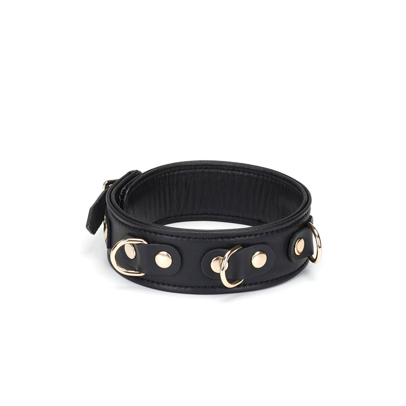 Luxurious black leather BDSM collar with gold-tone metal hardware from the Dark Secret collection
