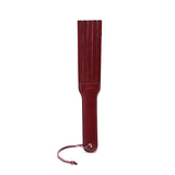Wine Red leather spanking paddle from LIEBE SEELE's Wine Red collection, featuring dual-side design for diverse impact play and a wrist strap