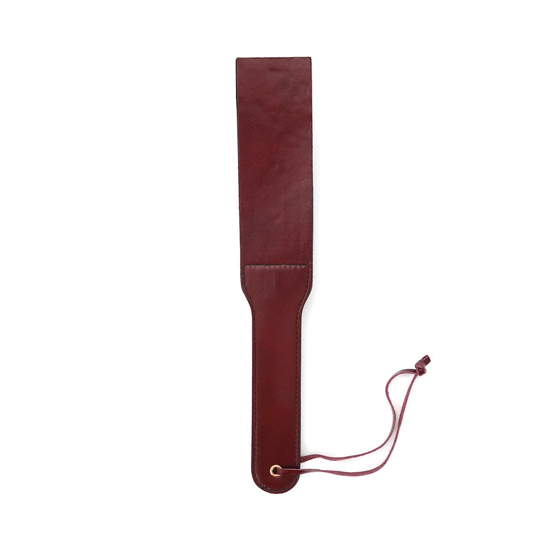 Wine red dual sensation leather spanking paddle with wrist strap for bondage play