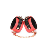Cherry Blossom Pink Leather Handcuffs with Rose Gold Hardware from Angel's & Demon's Kiss Collection