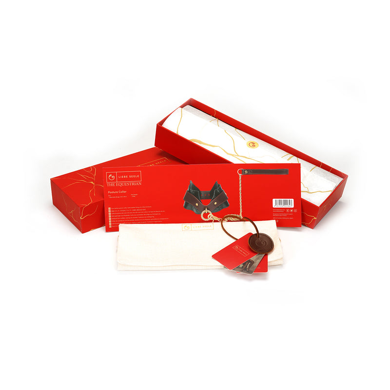 Luxurious Liebe Seele Equestrian collection leather posture collar in elegant red packaging with gold details, ideal for BDSM and fetish wear