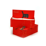 LIEBE SEELE Equestrian leather saddle harness in deluxe red gift box with wax seal, highlighting premium bondage accessory.