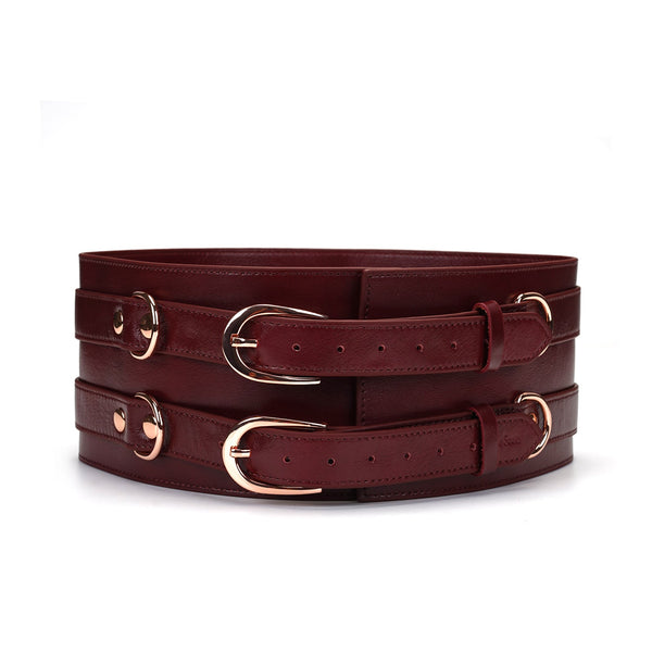 Luxurious wine red leather bondage waist belt with rose gold buckles and D-rings from the Wine Red collection